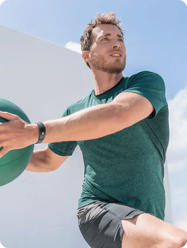 Track4U man with a ball excerising